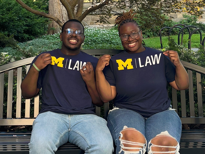 Current 1Ls Daryn Watson and Jayson Law in the Law Quad.