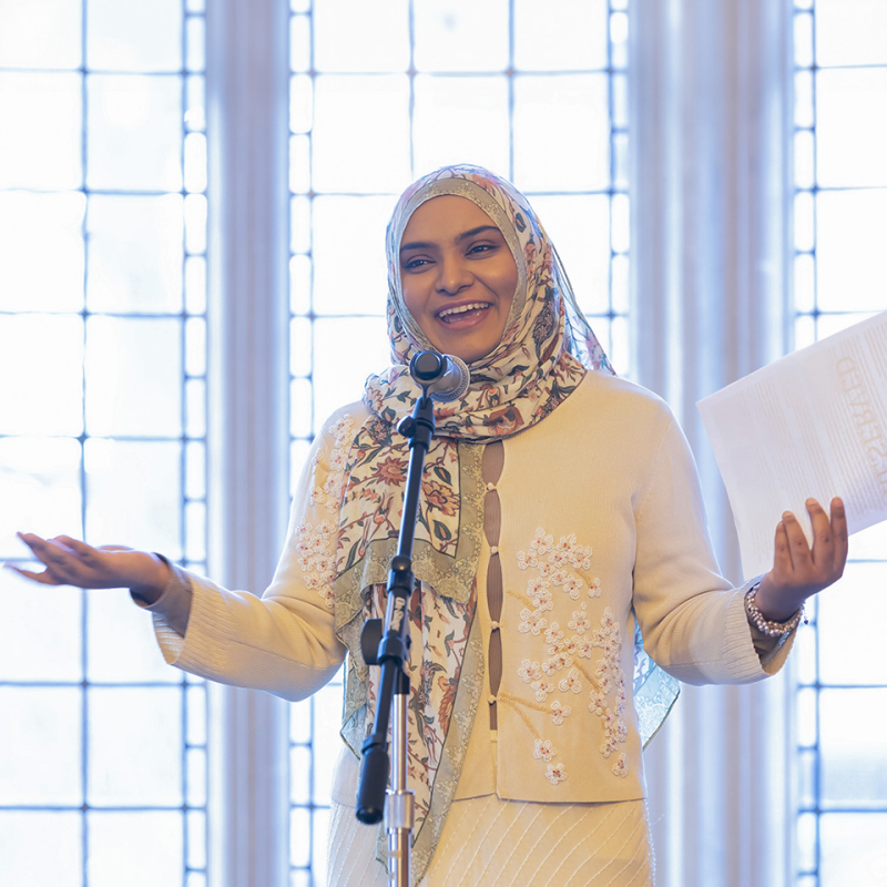 Raisa Faatimah speaking at the Michigan Law public interest storytelling event, The Valiant.