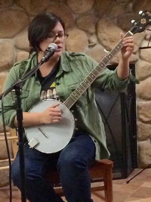 2L Jasmine Neosh worked in the arts and restaurant worlds in Chicago before earning her bachelor's degree at the College of Menominee Nation, one of 32 accredited tribal colleges and universities in the US.
