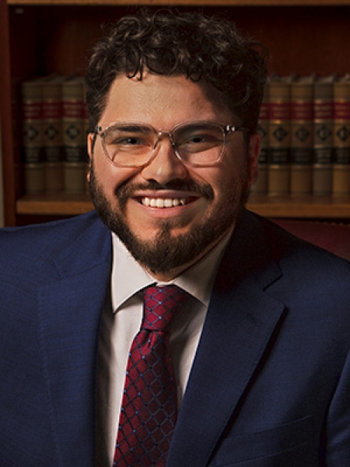 A portrait of Manuel Lewis.