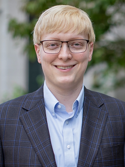 A portrait of Austin Nelson.