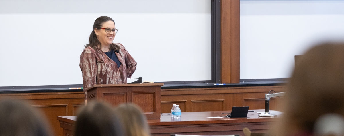 A person speaks at the podium during public interest week at University of Michigan law school