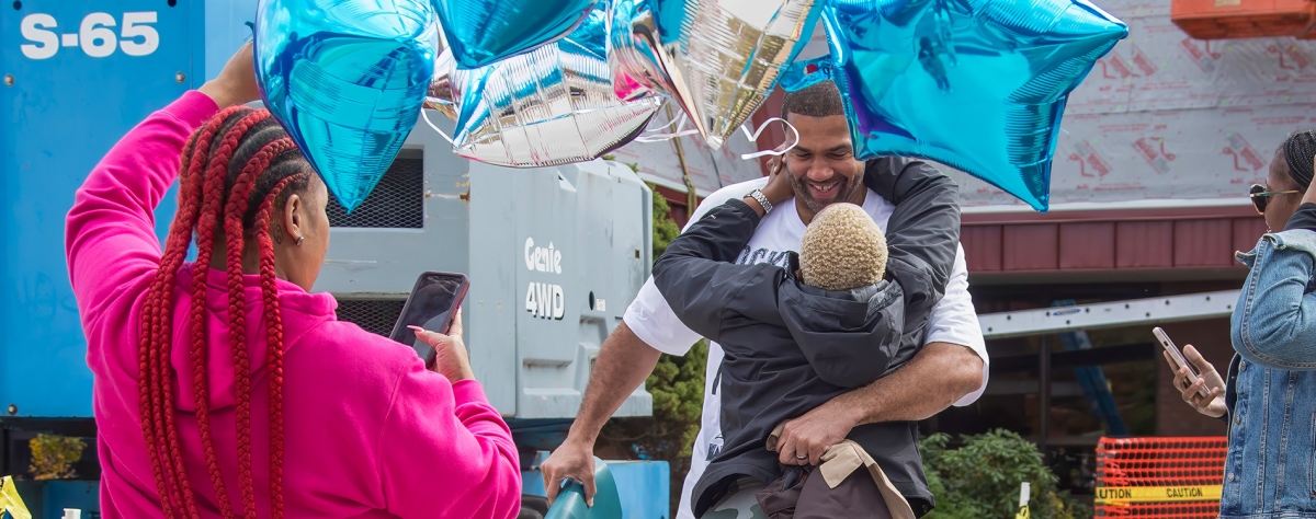 LaVone Hill embraces family after being released.