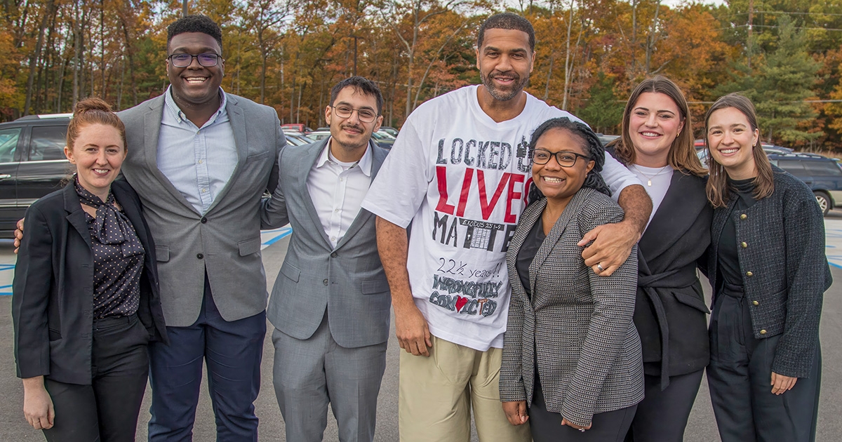 LaVone Hill, center, celebrates with members of his legal team following his release—from left, Michigan Innocence Clinic Fellow Olivia Vigiletti, 2L Kenneth Donaldson, 2L Ahmad Ibsais, MIC Co-Director Jenna Cobb, Isabelle Gross, '24, and Alyse Geiger, '24.