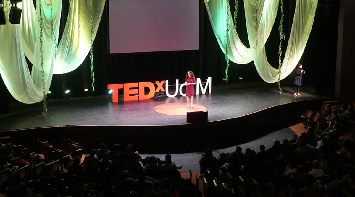 Tifani Sadek on stage at U of M TEDx