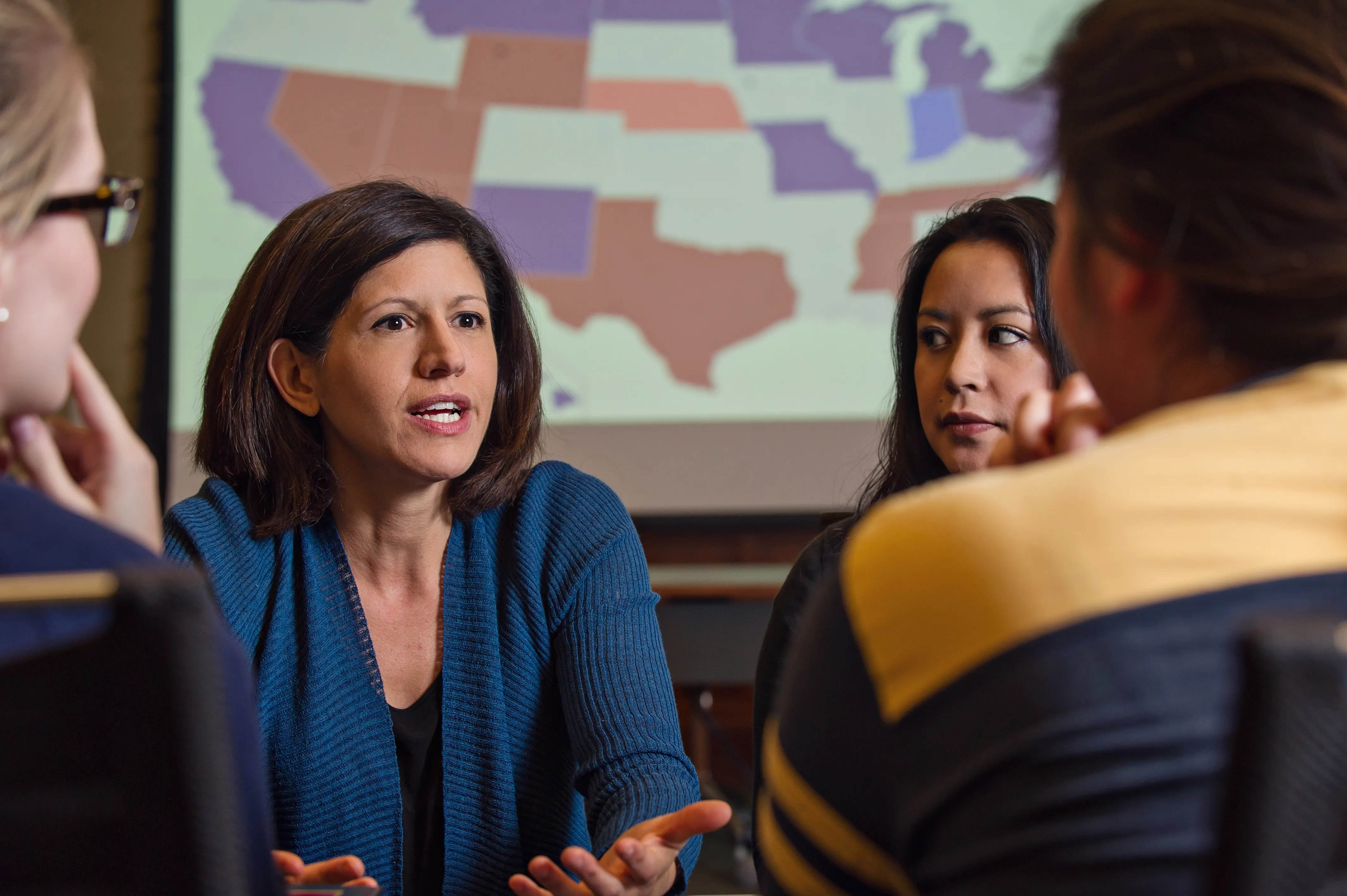 Ellen Katz speaks with students in classroom