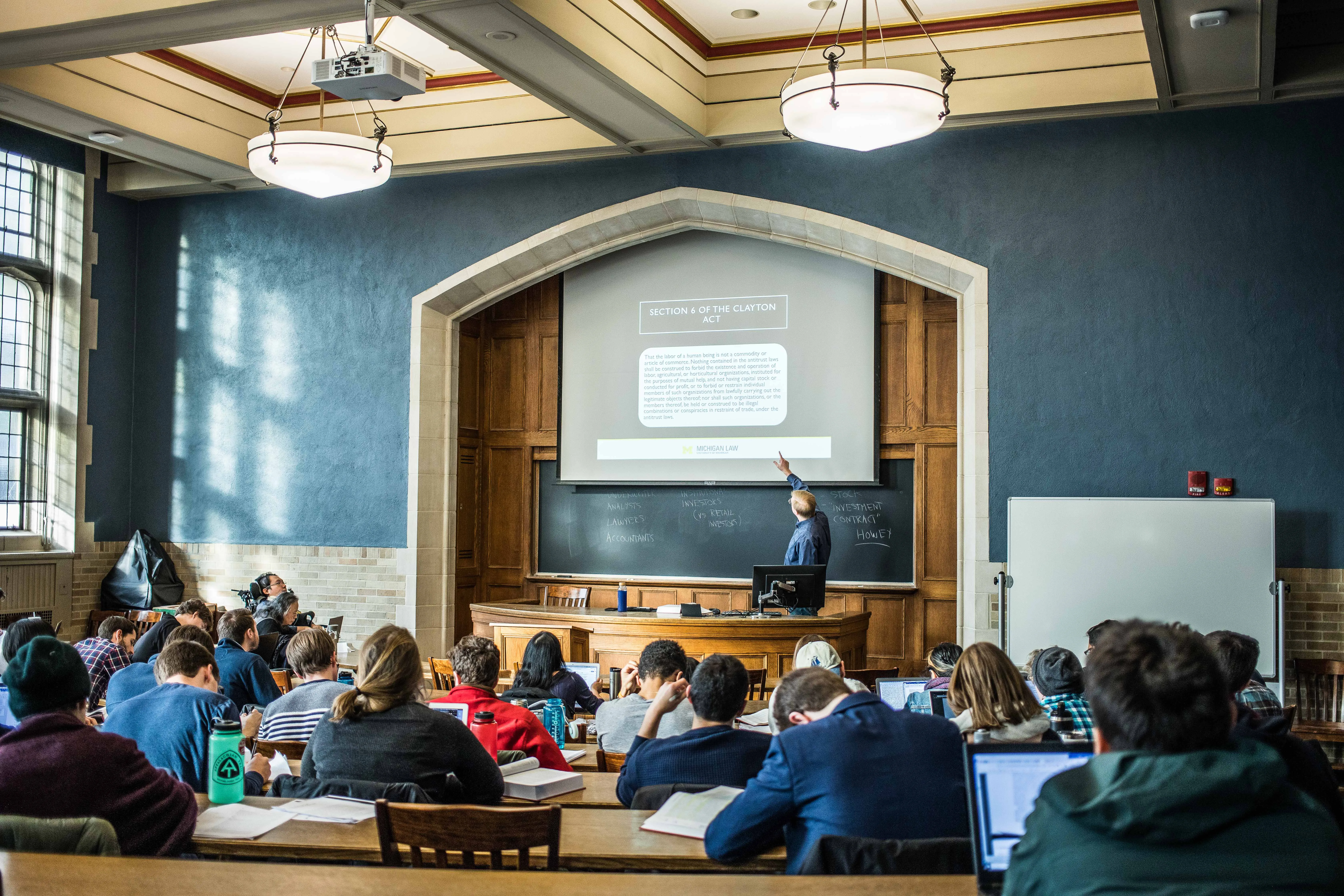 Sam Bagenstos teaching in the front of a classroom full of students