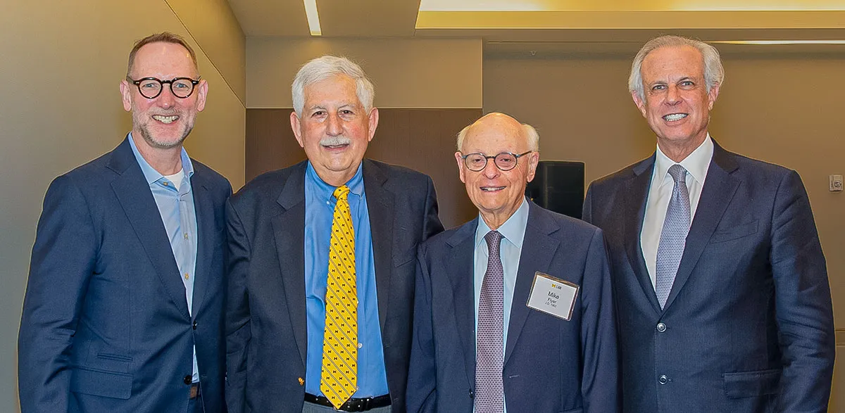 Tucker with West and two others