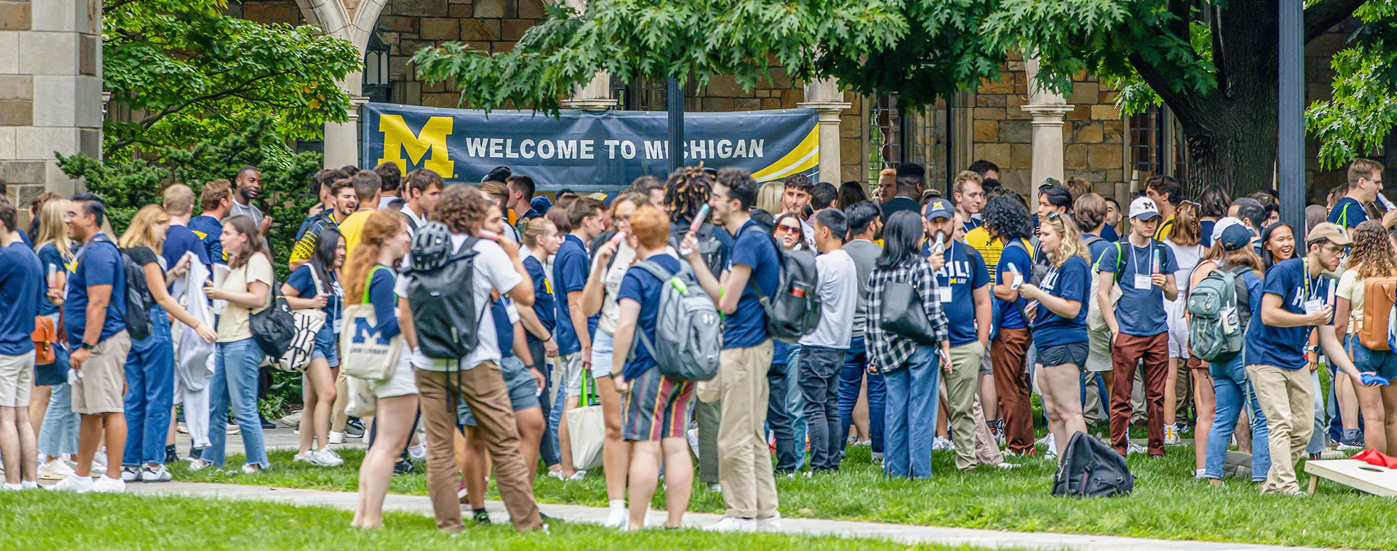 Student Orientation 2023 class gathers outside in the Law Quad