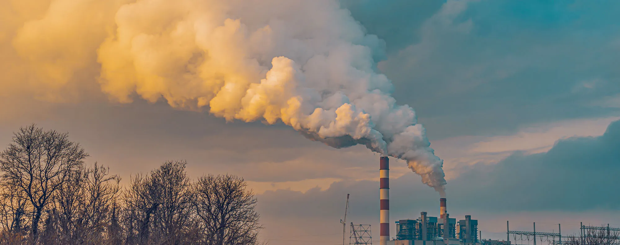 a smokestack with smoke coming out of it