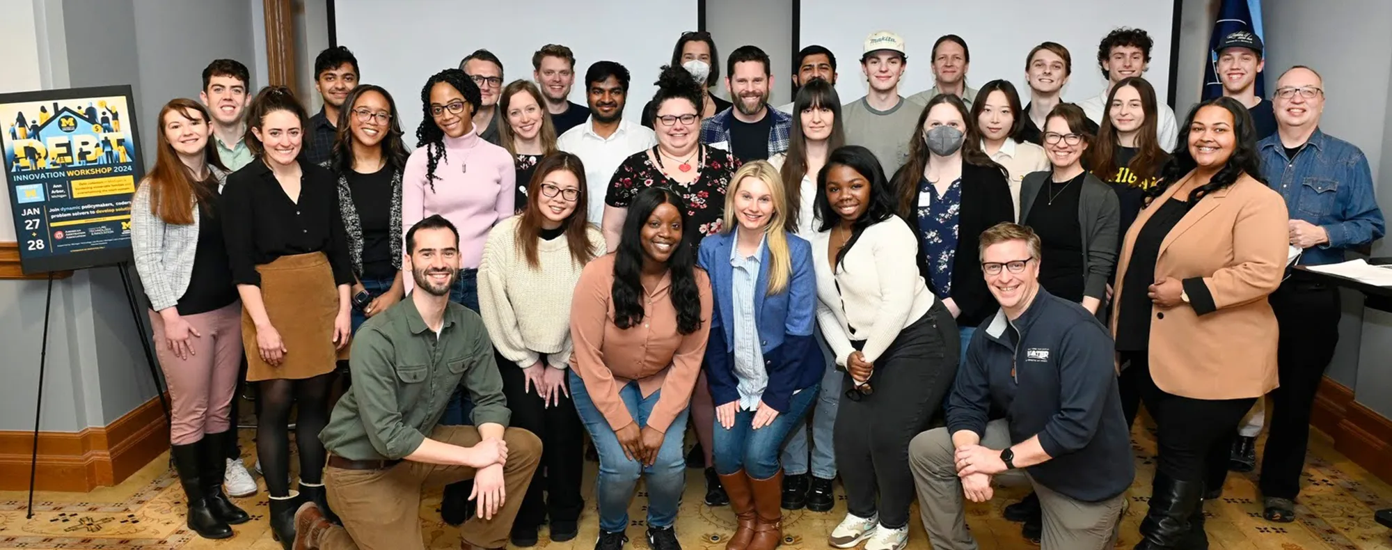 Group image of of attendees of a debt workshop