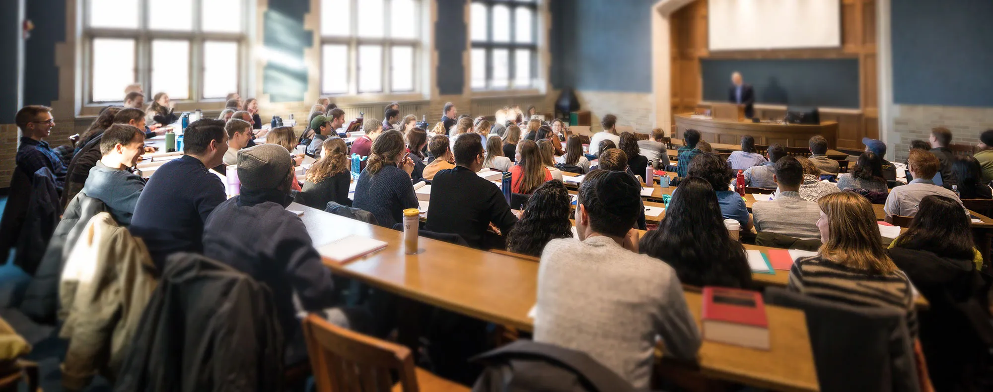 Michigan Law students listening to a professor lecturing during class.