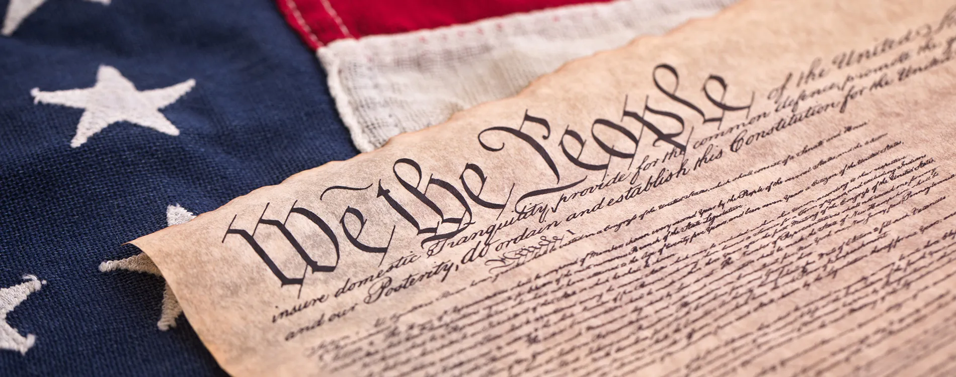 United States Constitution on the American flag.