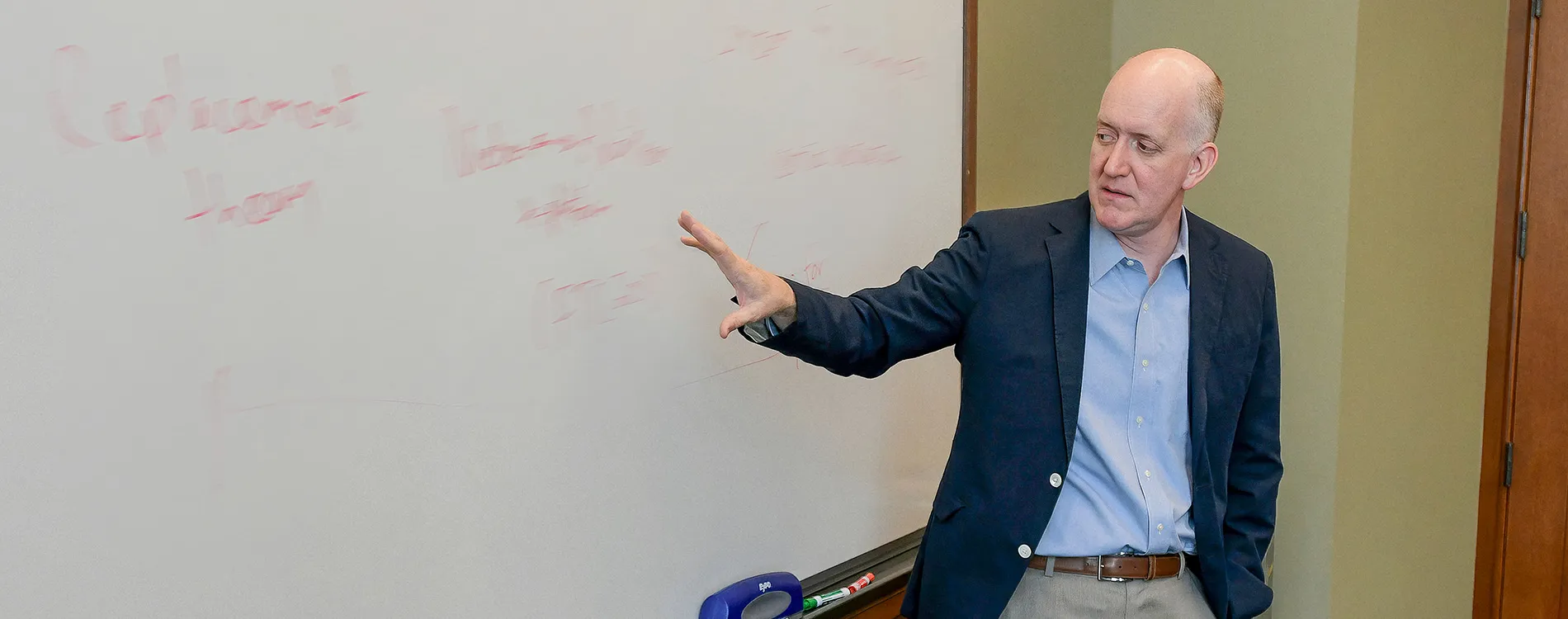 Daniel Crane teaches in front of a class of Michigan Law students.