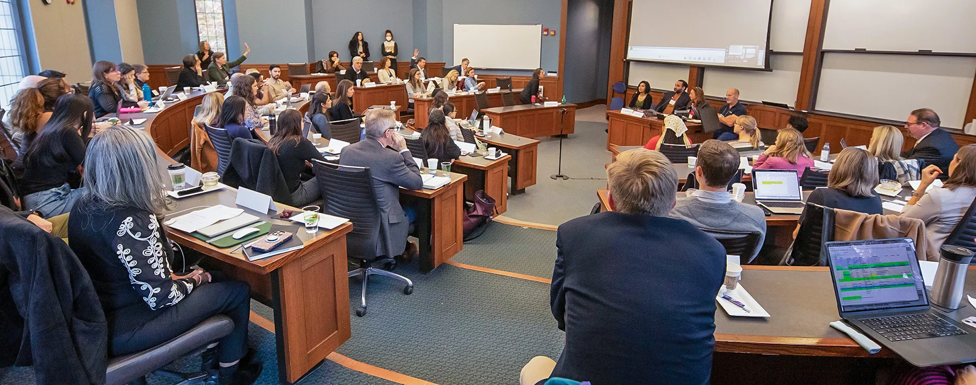 Attendees of the Transnational Law Symposium at Michigan Law ask panelists questions.
