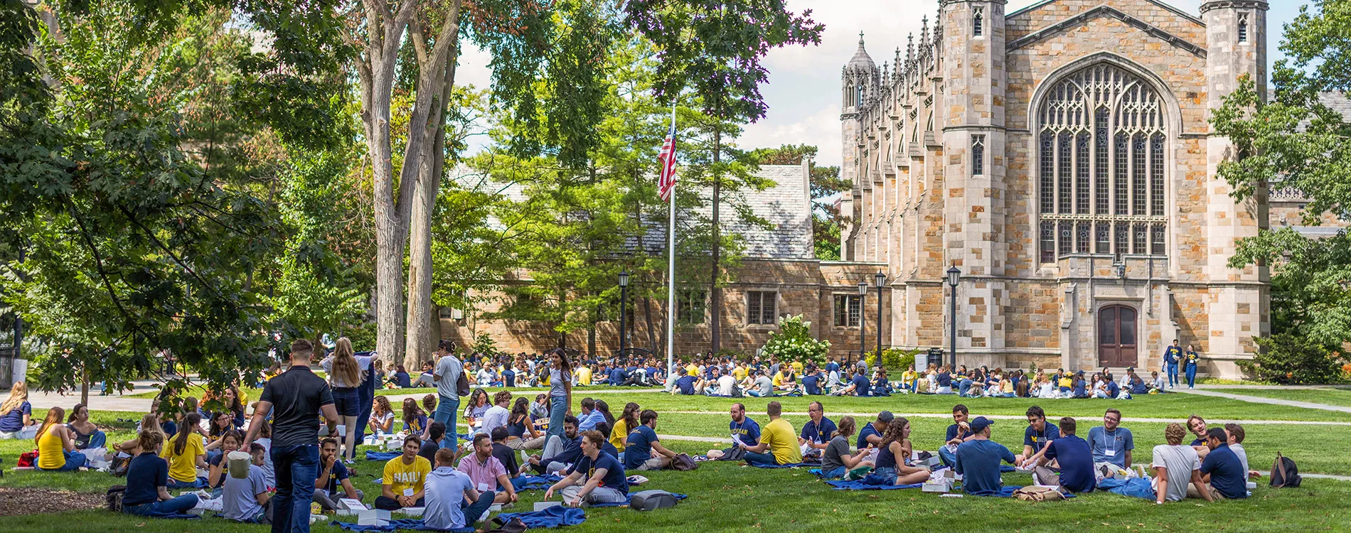 Michigan Law students gathered in groups in the Law Quad during Orientation 2025.