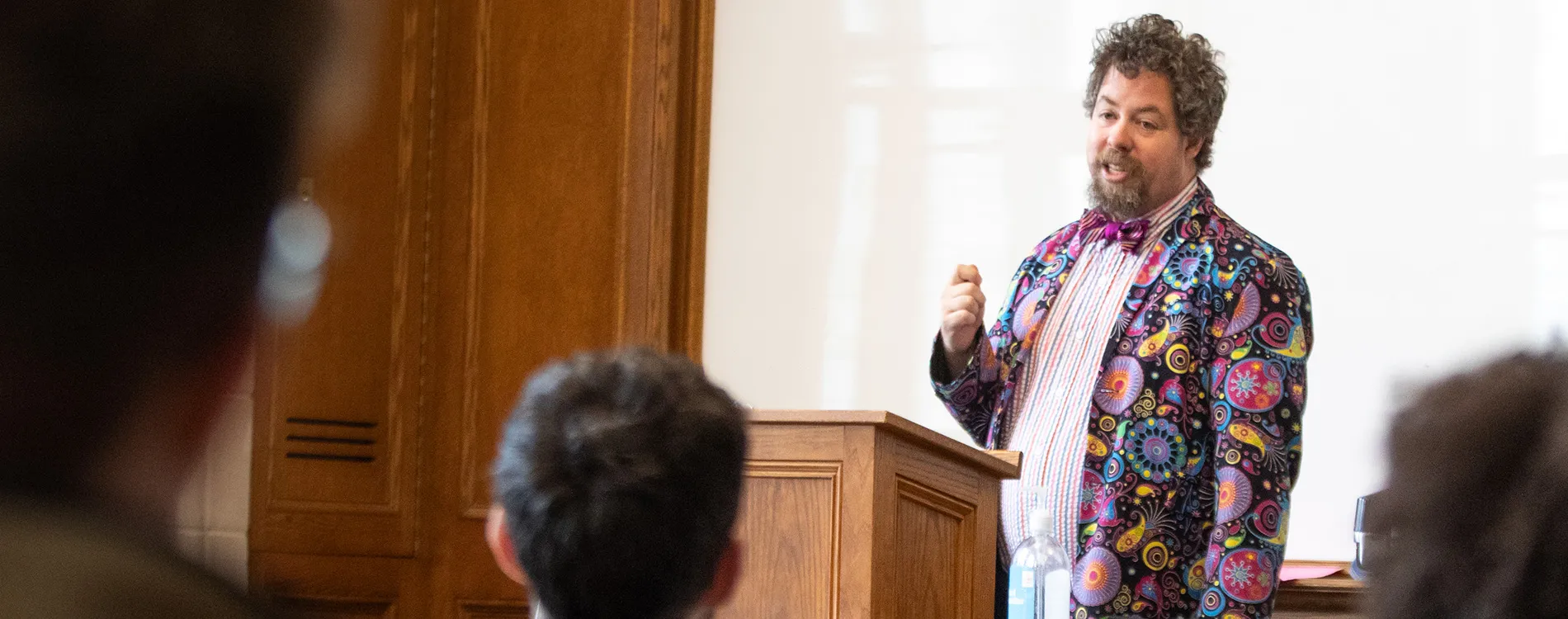Nicholson Price teaching in a room of Michigan Law students.