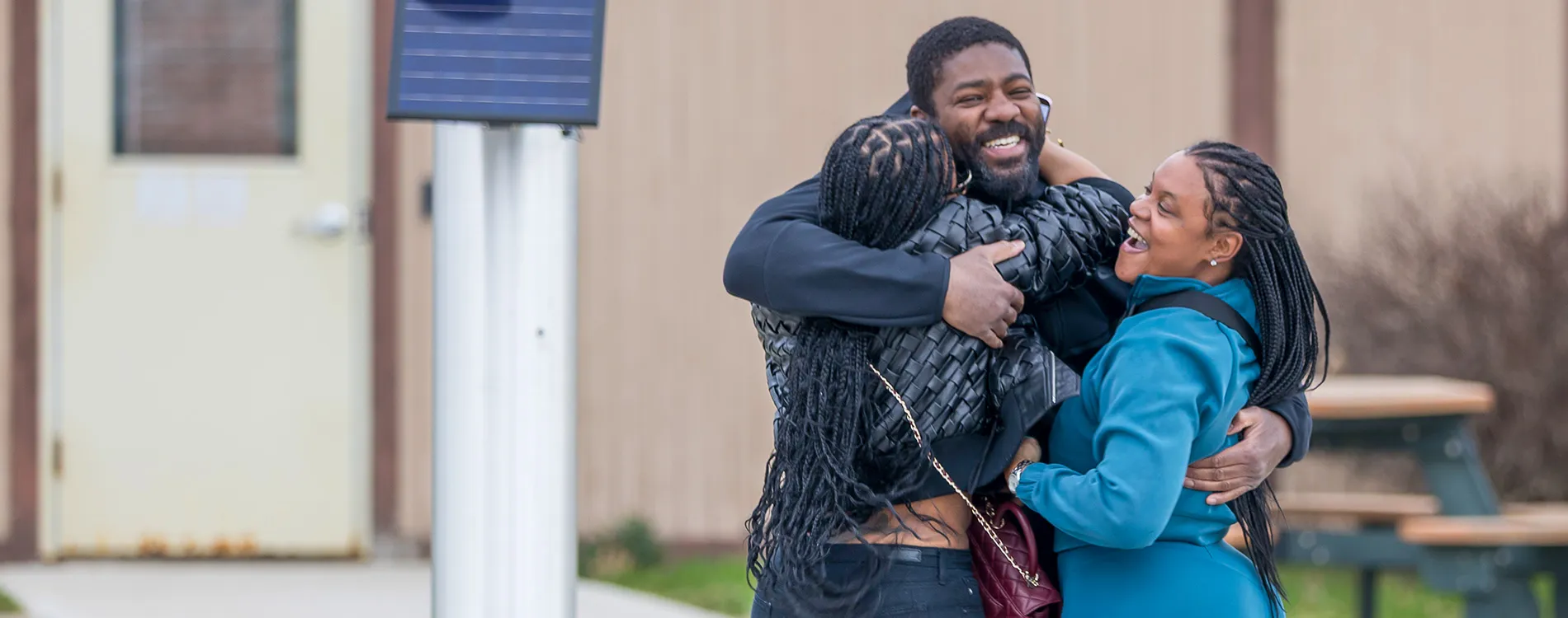 Roy Blackman embraces his family after being exonerated with the help of the Michigan Law Innocence Clinic.