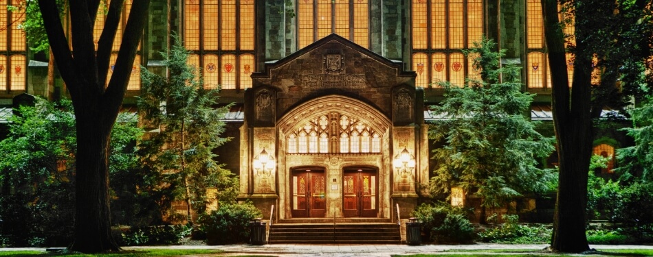 Exterior view of the Reading Room entrance at night 