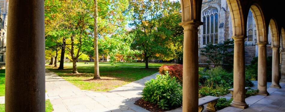 Exterior view from Lawyers Club Alcove in the Fall looking towards the Law Quad