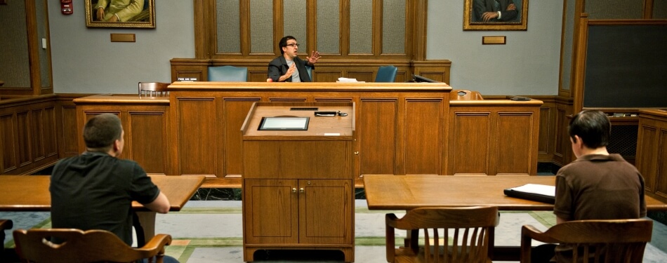 Profess Santacroce teaching in the moot court room.
