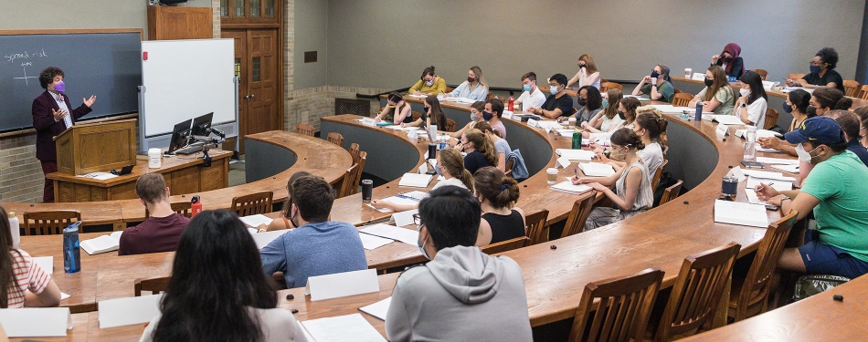 Nicholson Price lectures in front of a classroom of students