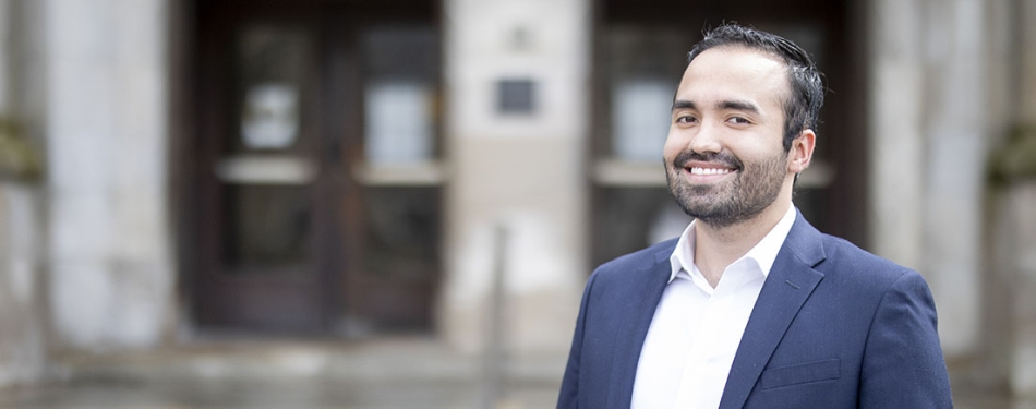 Luis Diaz stands in front of Hutchins Hall.