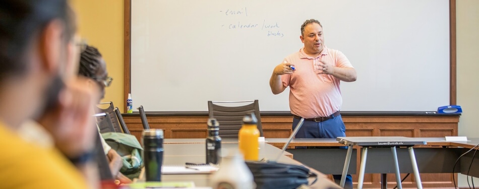 Professor Oday Salim teaching law students during the Environmental Law and Sustainability Clinic seminar.