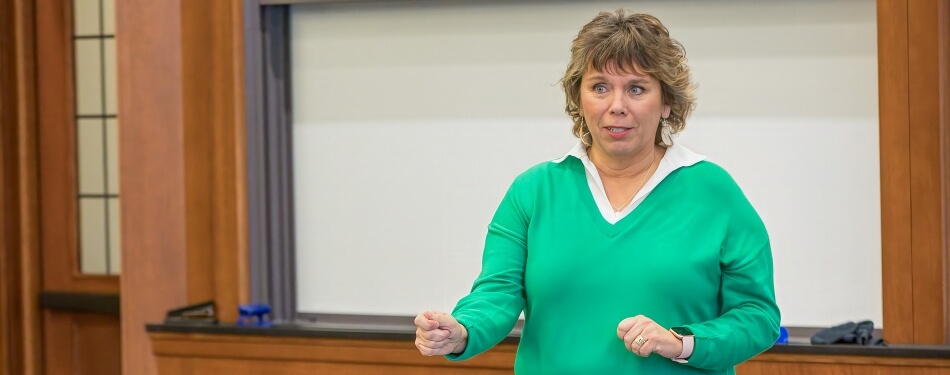 Anne McKeig speaking at the Tribal State Federal Judicial Forum Meeting