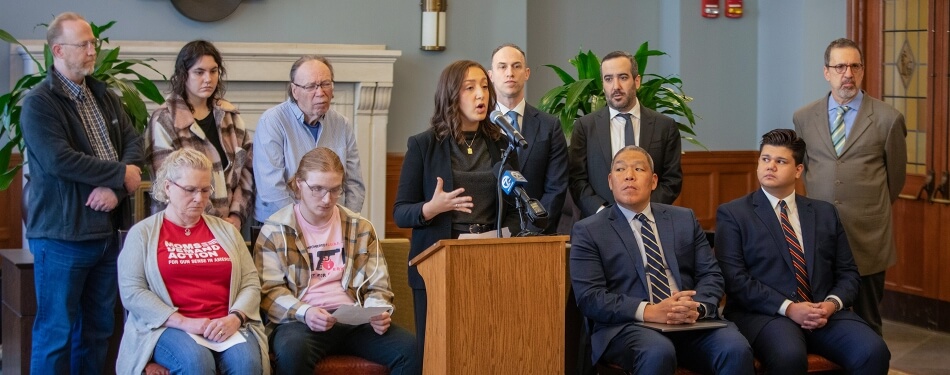 Michigan Law student speaking at a press conference for clinic client