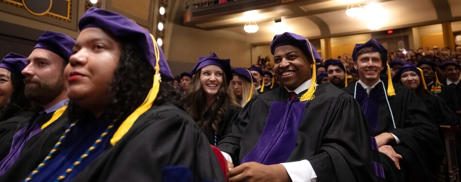 An audience of graduating Michigan Law students seated at the graduation commencement ceremony.