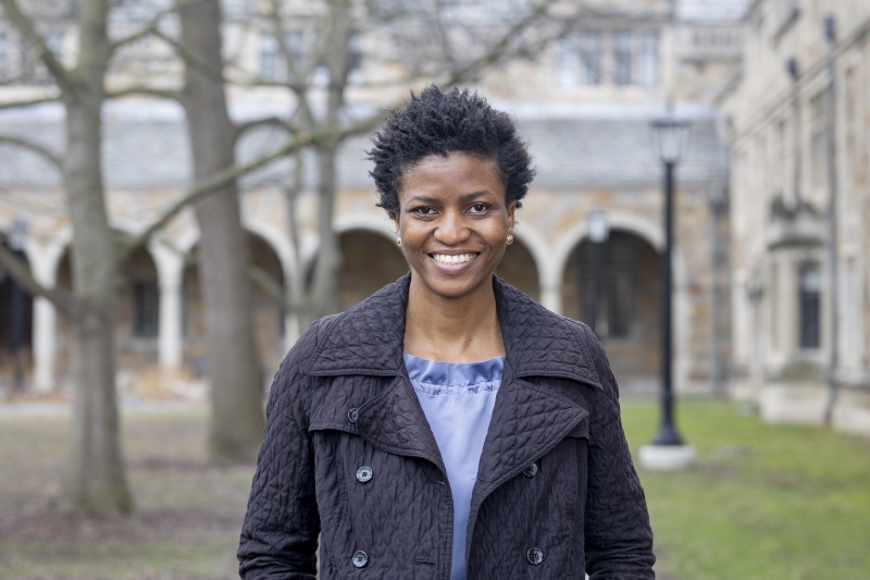 Abimbola Adekoya stands in the Michigan Law Quad.