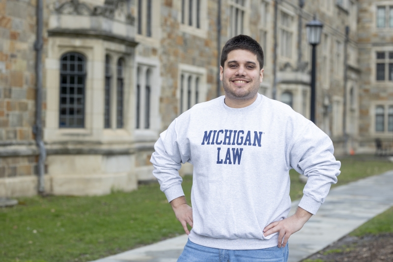 René Figueredo Corrales stands in the Michigan Law Quad.