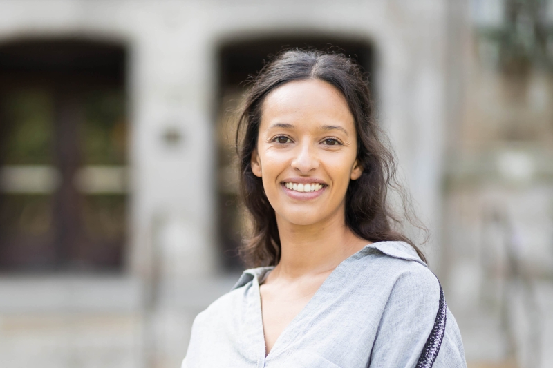 Camila Calvo smiles in the sunny Law Quad.