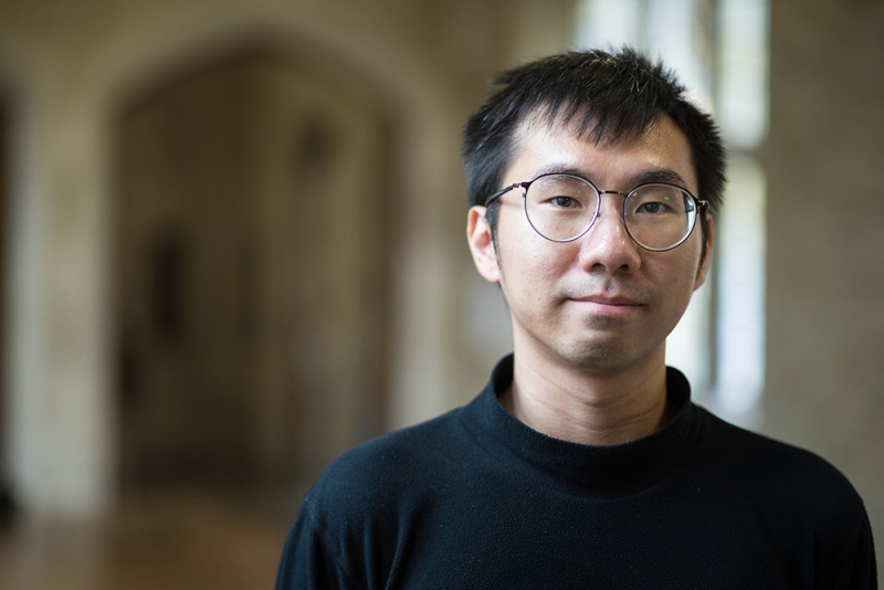 Jeffrey Wu stands in Jeffreys Hall.
