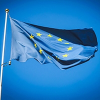 A blue flag on a pole.
