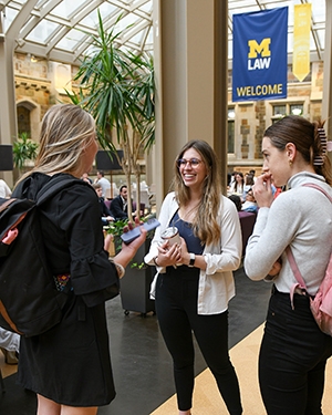Class of 2025 students meet in the law school commons