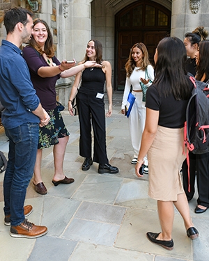 Class of 2025 group of students meet in the quadrangle