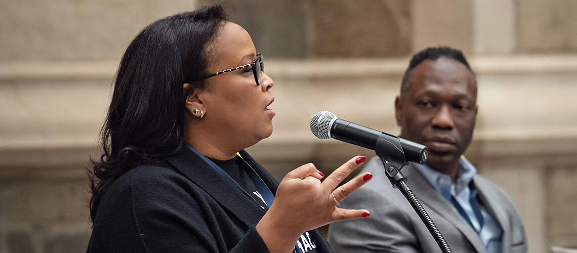 A Michigan Law alumni leads a discussion in Aikens Commons.