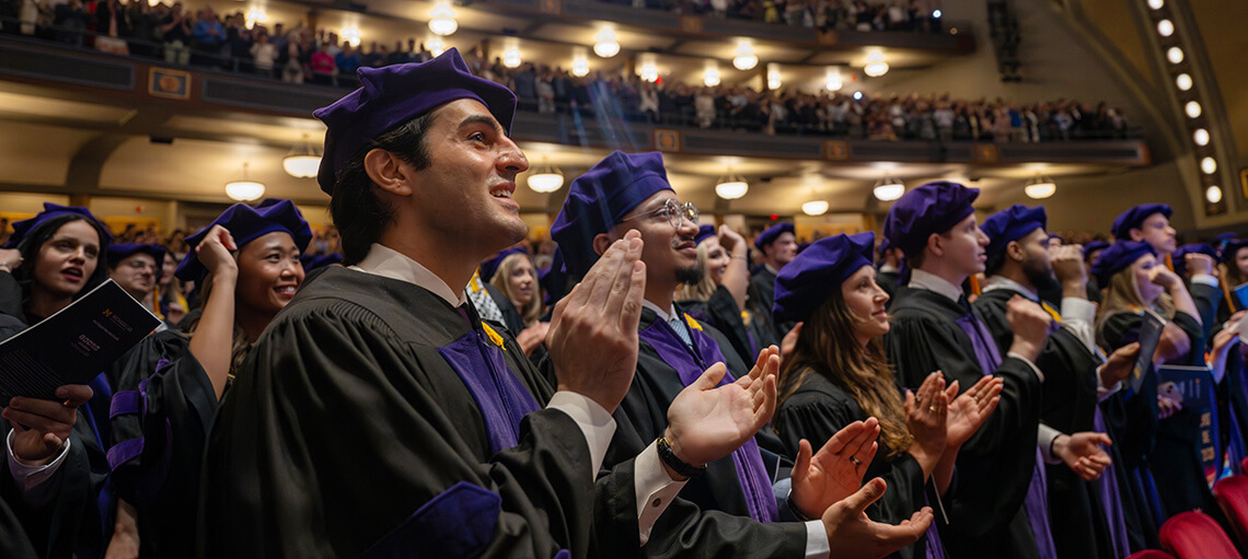 Michigan Law students clap and cheer during Senior Day.