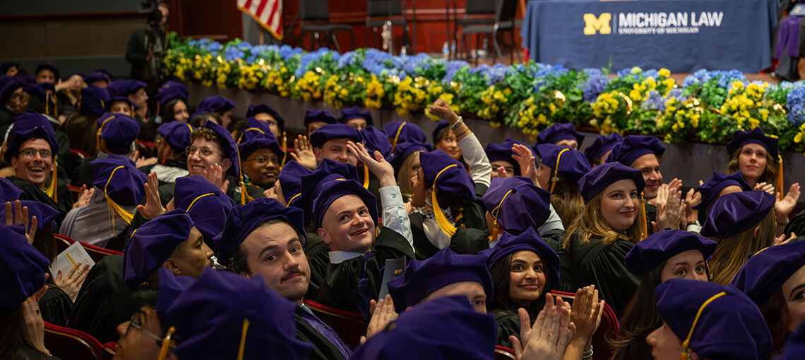 Michigan Law students clapping during Senior Day.