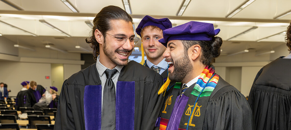 A group of Michigan Law Students prepare for Senior Day.
