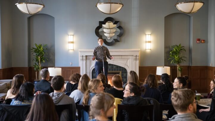 Lara Finkbeiner speaks in the student lounge in front of students at careers event The Valiant