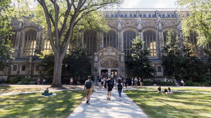 Students walking around the Law Quad, beauty