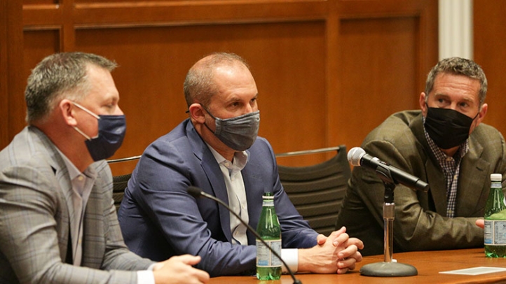 Three People Speaking about the Law of Baseball