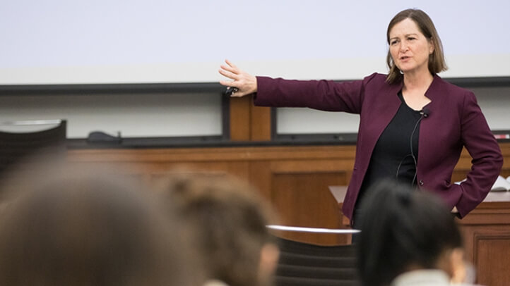 Barbara McQuade teaching in front of a classroom full of students