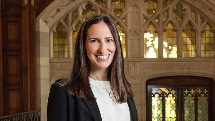 Professor Kristin Wolff standing in the Michigan Law Reading Room