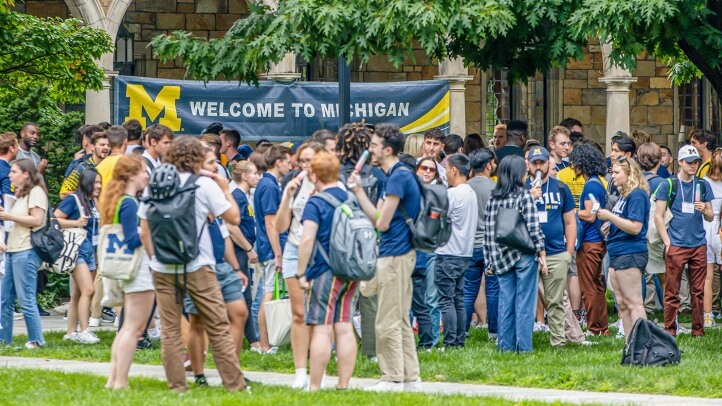 Student Orientation 2023 class gathers outside in the Law Quad