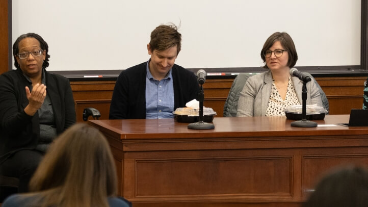 Four people sitting on a panel for the public interest week at University of Michigan Michigan law school.