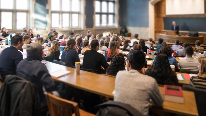 Michigan Law students listening to a professor lecturing during class.